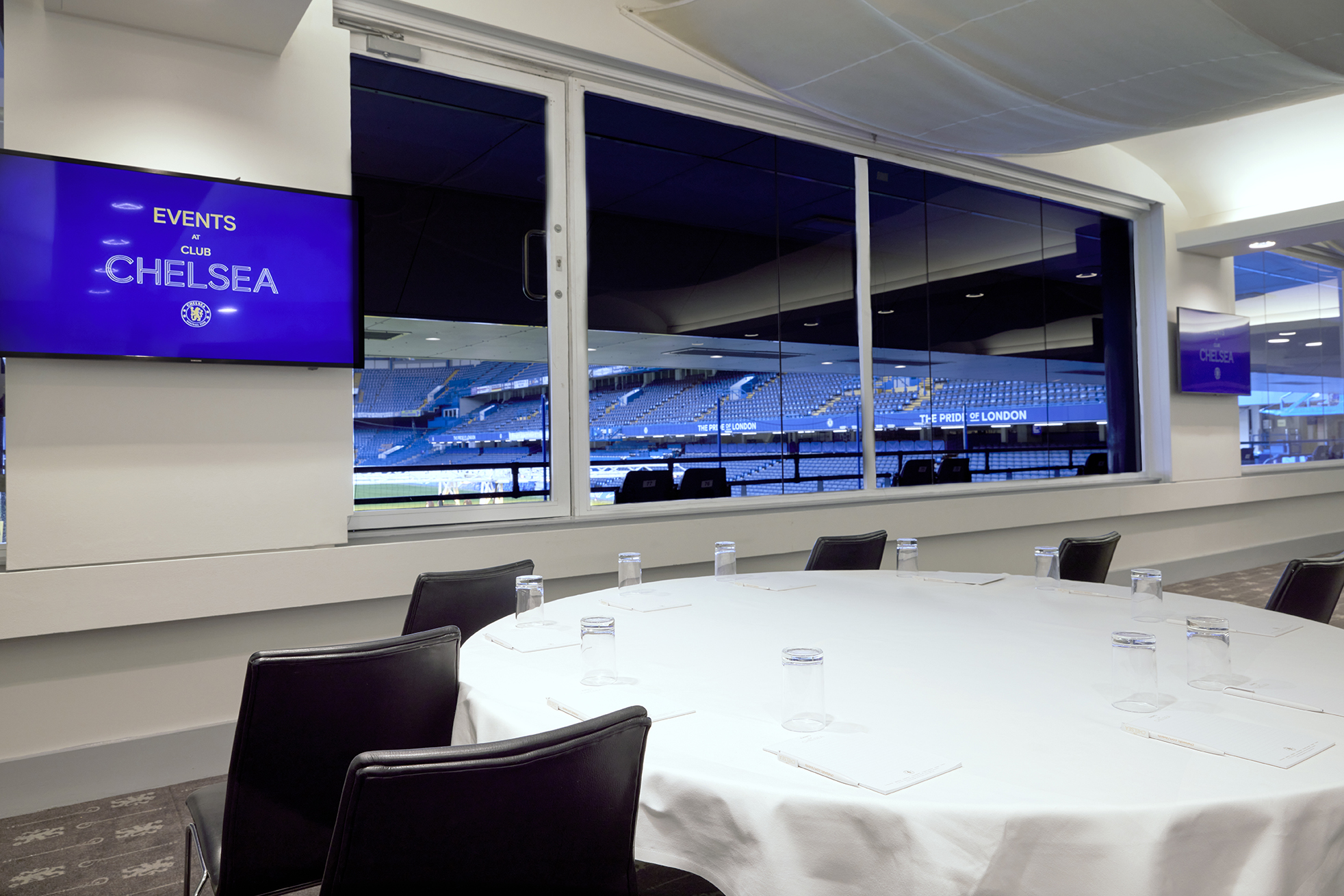 Canoville Suite at Chelsea FC: modern meeting space with stadium views for corporate events. - Banner