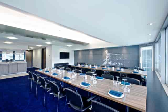 Millennium Suite at Chelsea FC: modern meeting room with elegant decor for professional events.