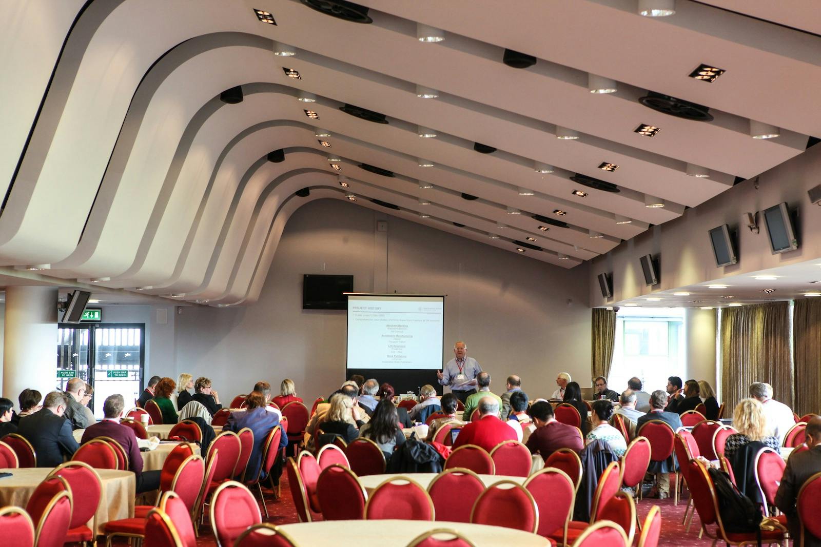 Papillon Suite conference room at Aintree Racecourse, modern design for presentations.