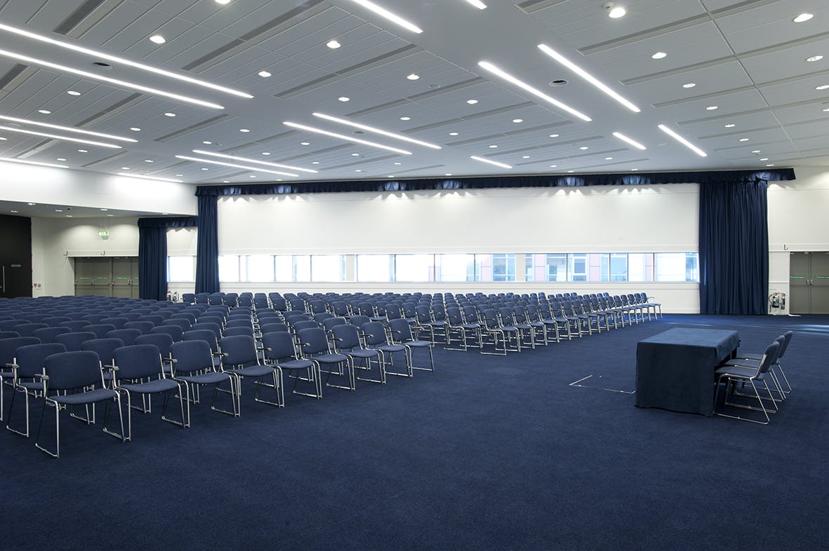 Spacious Manchester Central conference venue with modern design and natural light.