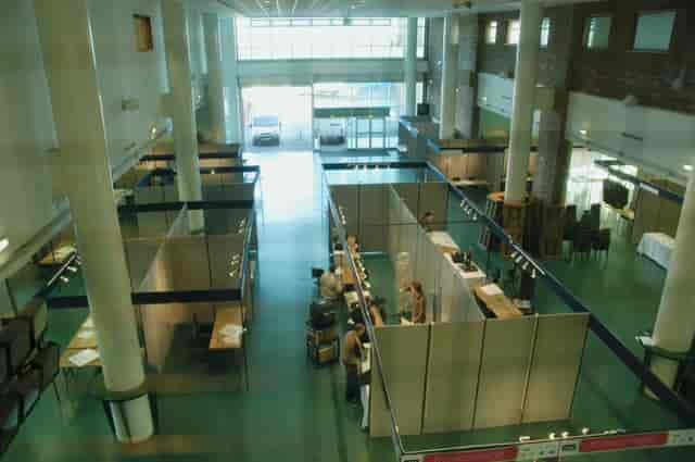 Aintree Racecourse Exhibition Hall set up for a conference with modular booths.