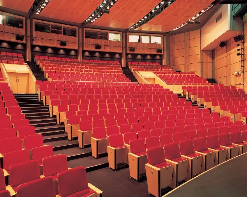 Exchange Hall in Manchester Central: tiered seating auditorium for conferences and presentations.