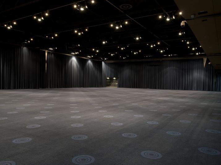 Exchange Hall in Manchester Central, spacious event venue with polished flooring for conferences.