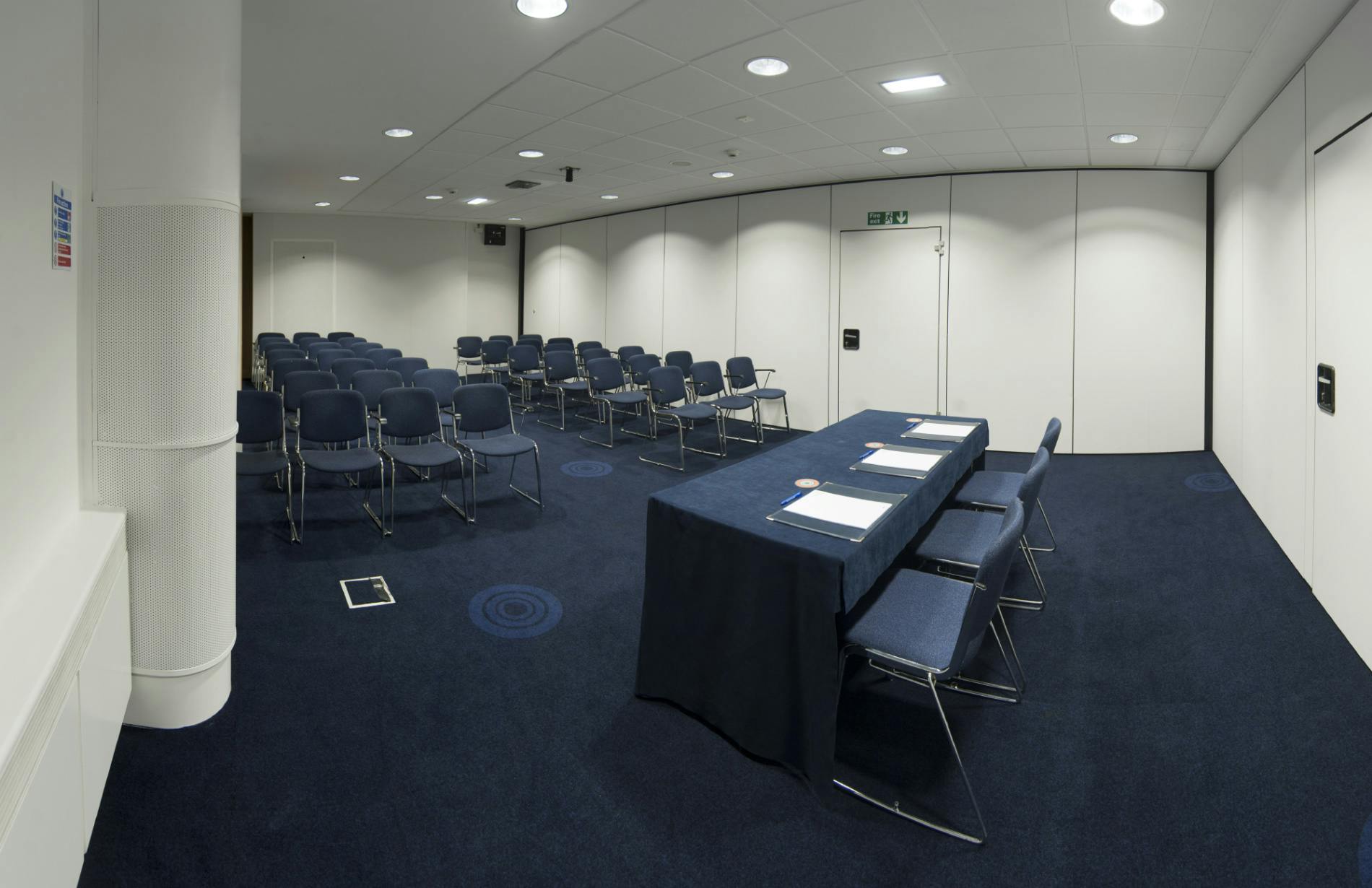 "Exchange Room 8 in Manchester Central, modern meeting space for workshops and presentations."