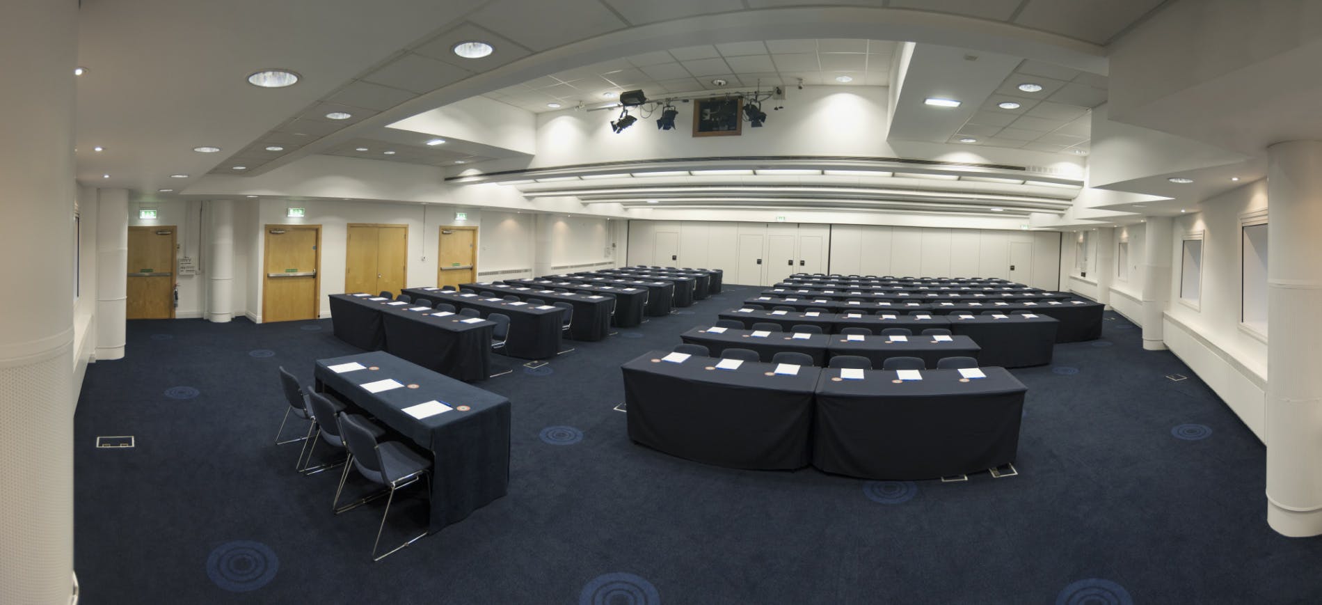 Exchange Room 9 in Manchester Central, organized for a professional conference or seminar.