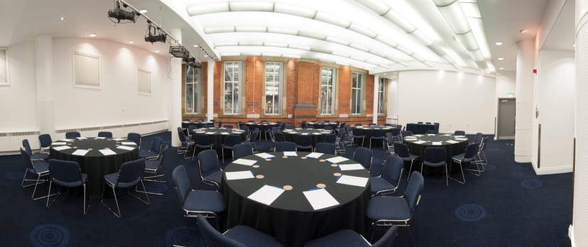 Exchange Room 11 in Manchester Central, bright event space for workshops and conferences.