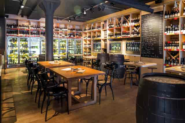 Stylish wine bar with rustic charm, perfect for corporate events and private tastings.