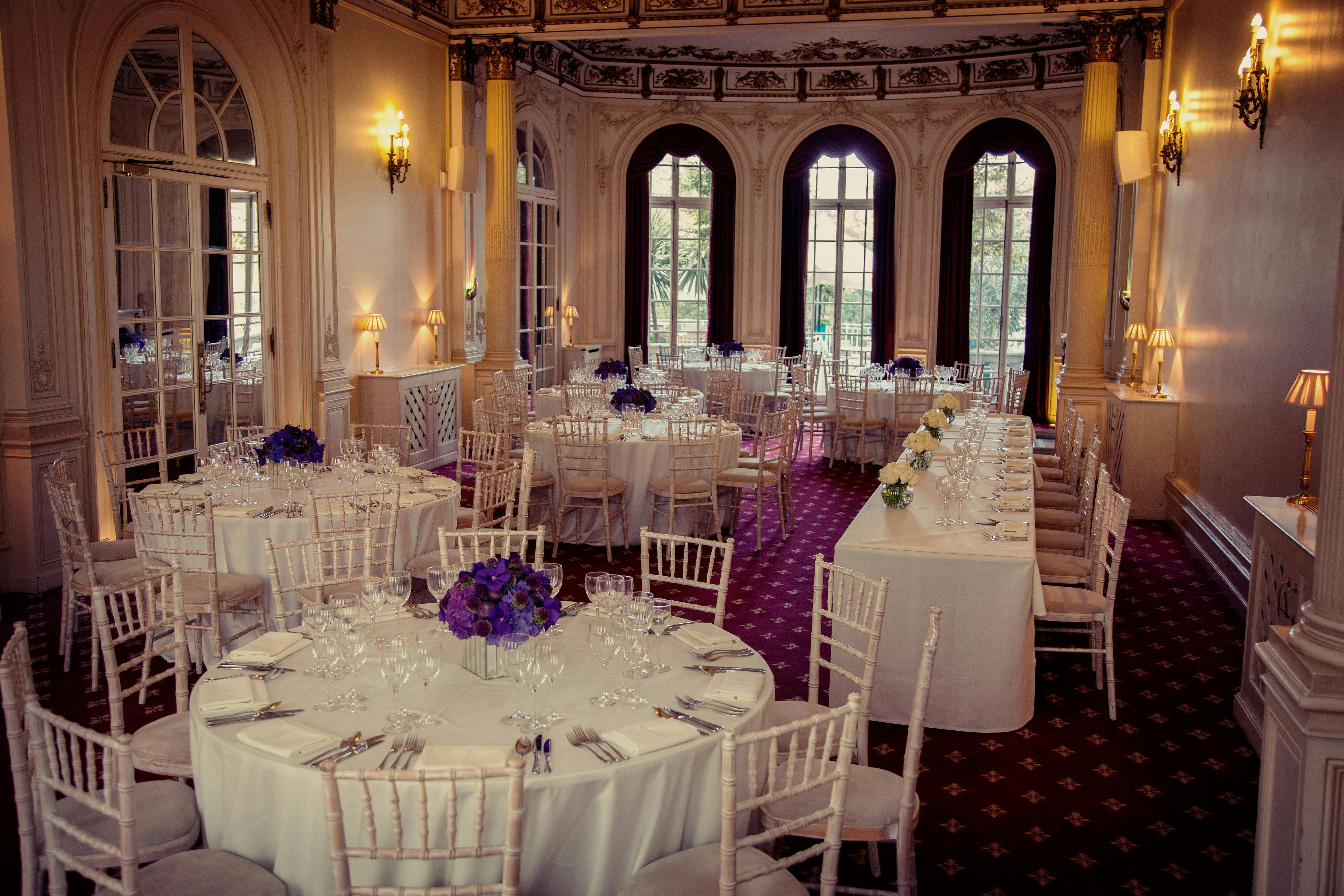 Elegant Argyll Room with round tables, ideal for weddings and formal events.