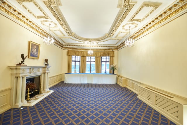 Elegant meeting space with chandeliers at Marshall of Cambridge, perfect for corporate events.