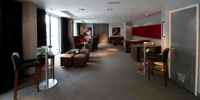 Modern meeting space with natural light at The Bermondsey Square Hotel for events.