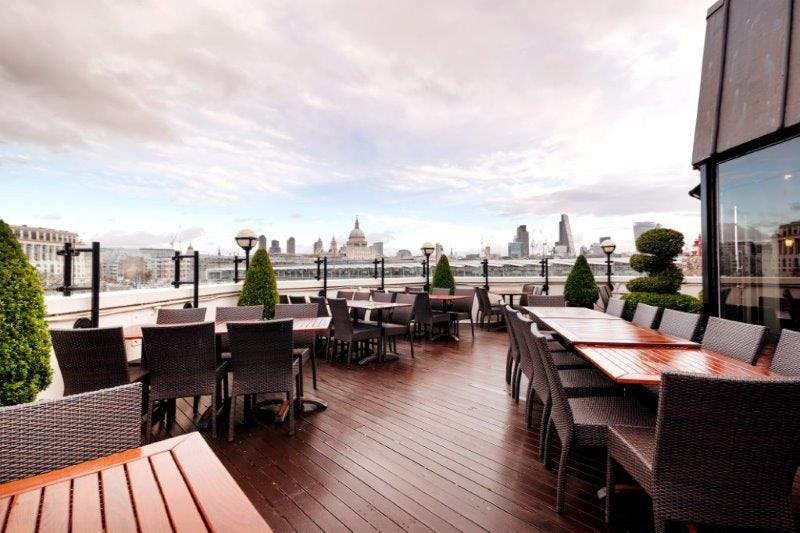 Stylish outdoor terrace at Doggett's Coat and Badge, perfect for networking events.