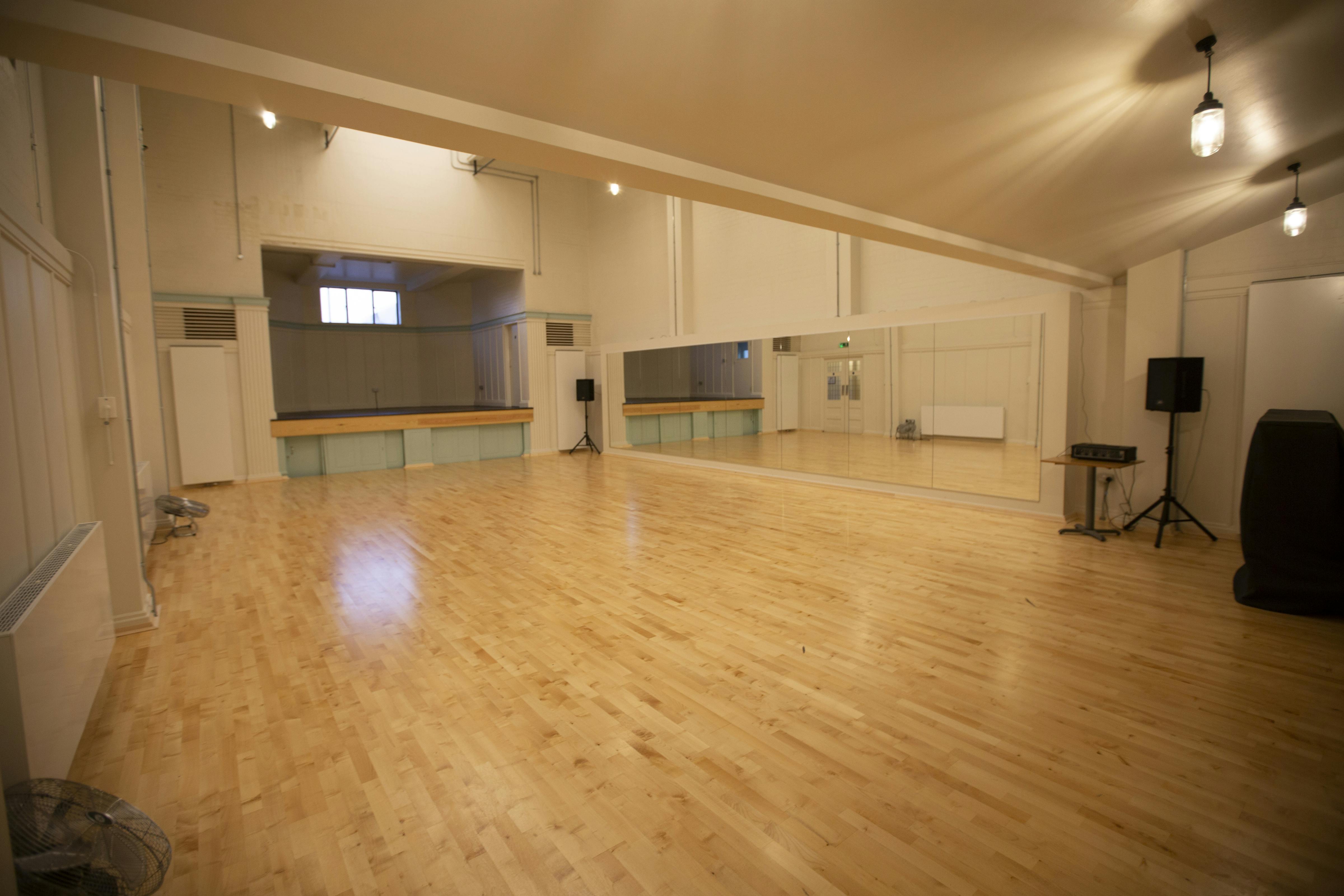 Spacious, well-lit Studio 1 at International College of Musical Theatre for workshops and fitness.