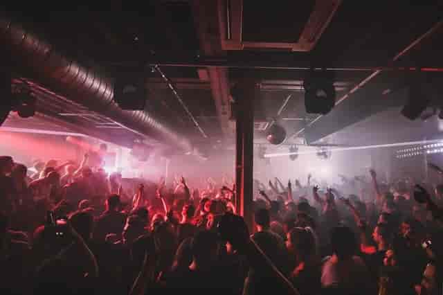 Vibrant XOYO MAIN SPACE concert with dynamic lighting and energetic crowd atmosphere.