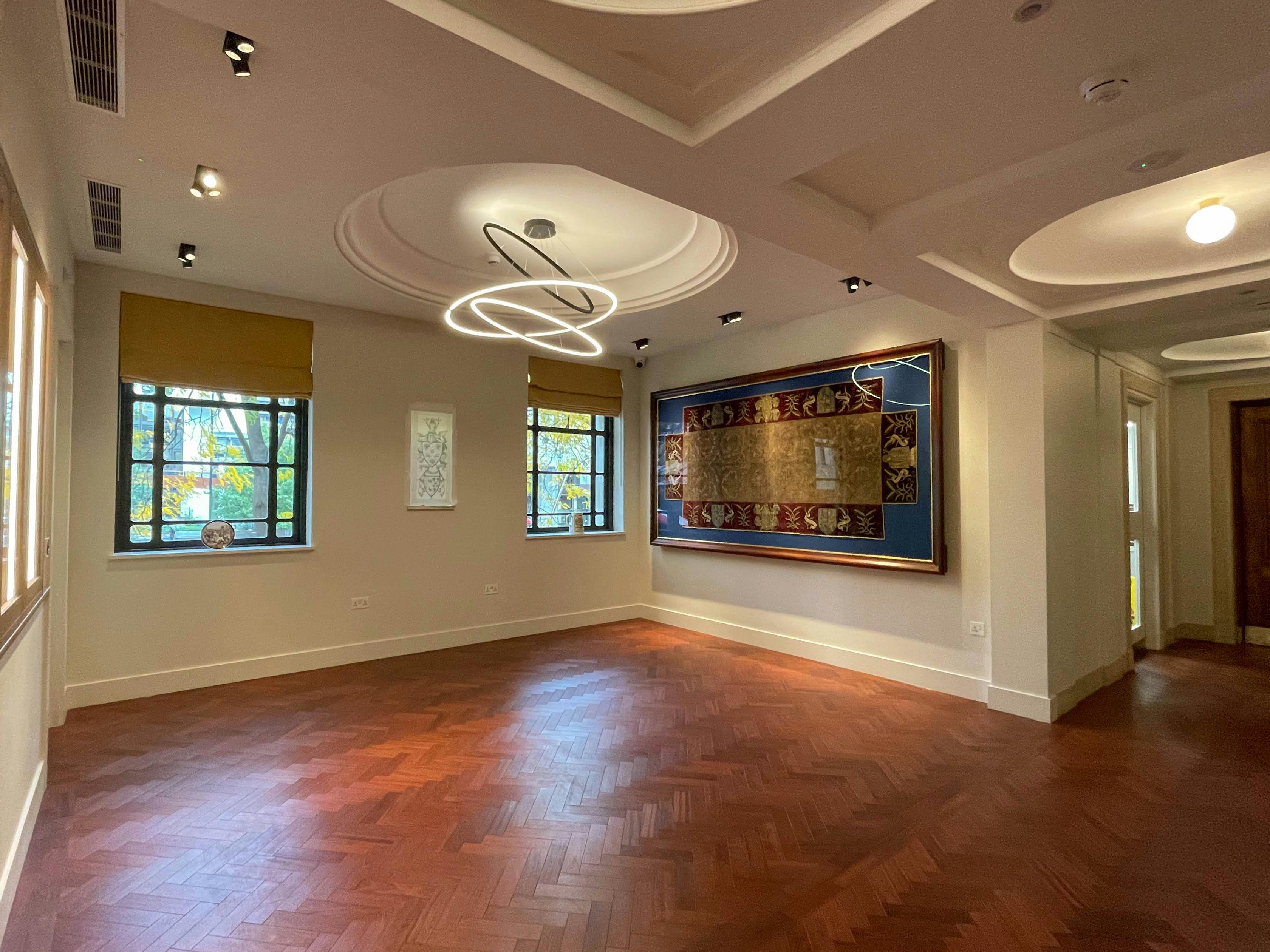 Elegant meeting space in Brewers Hall with modern lighting and natural light.