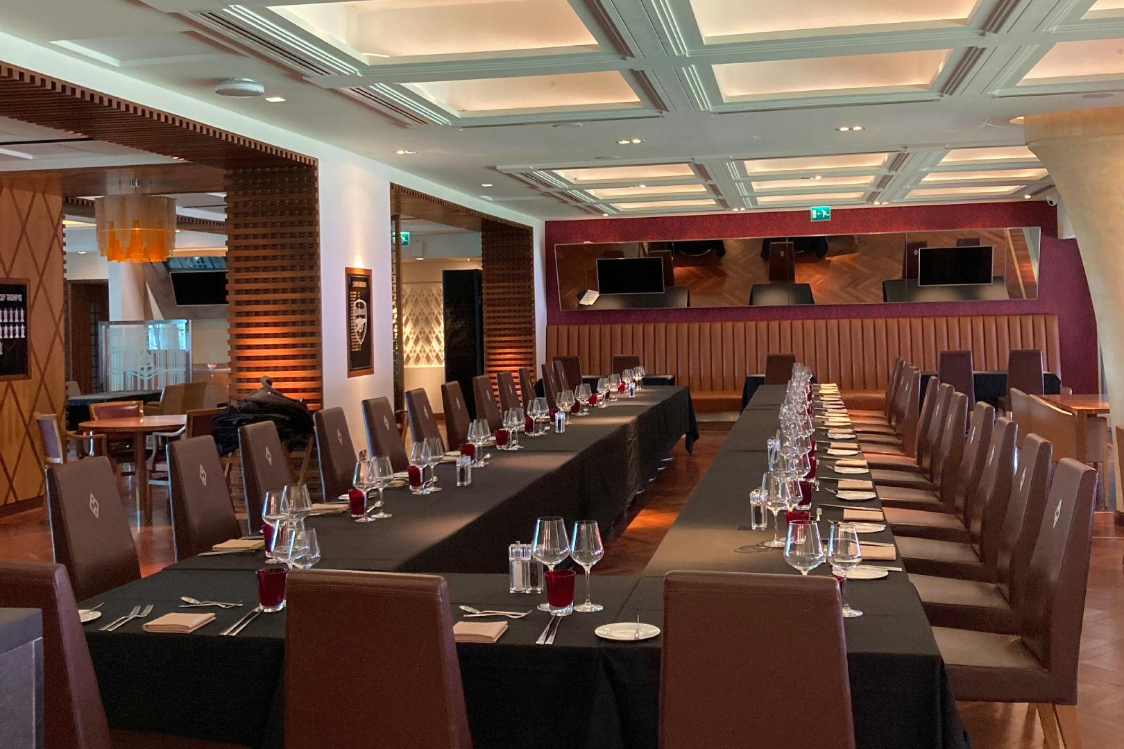 Elegant dining space at Arsenal's Diamond Club for corporate events and private gatherings.