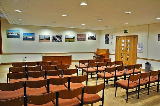 Small Meeting Room in Liverpool Quaker House, semi-circle seating for events and presentations.