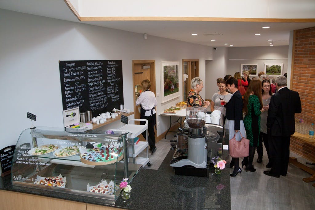 Networking event in Liverpool Quaker Meeting House with stylish refreshment area.