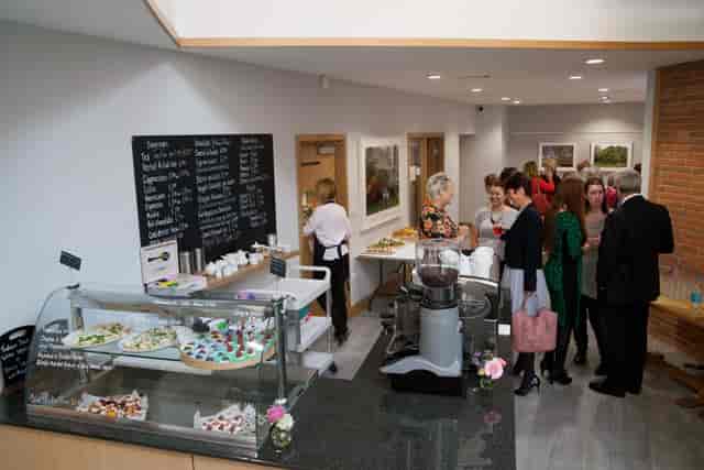 Networking event in Liverpool Quaker Meeting House with stylish refreshment area.