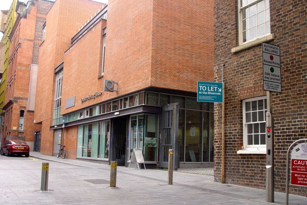 Liverpool Quaker Meeting House library with large windows, ideal for events and meetings.