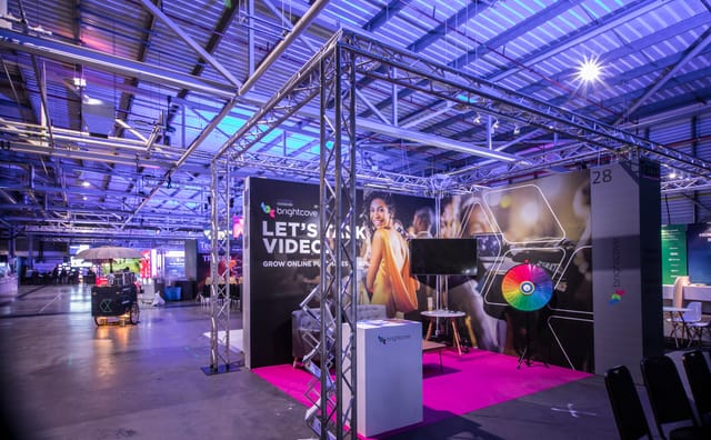 HSBC exhibition booth in Printworks London with vibrant design for networking events.