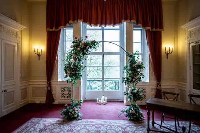 Elegant floral arch in Six Park Place's Drawing Room, perfect for weddings and events.
