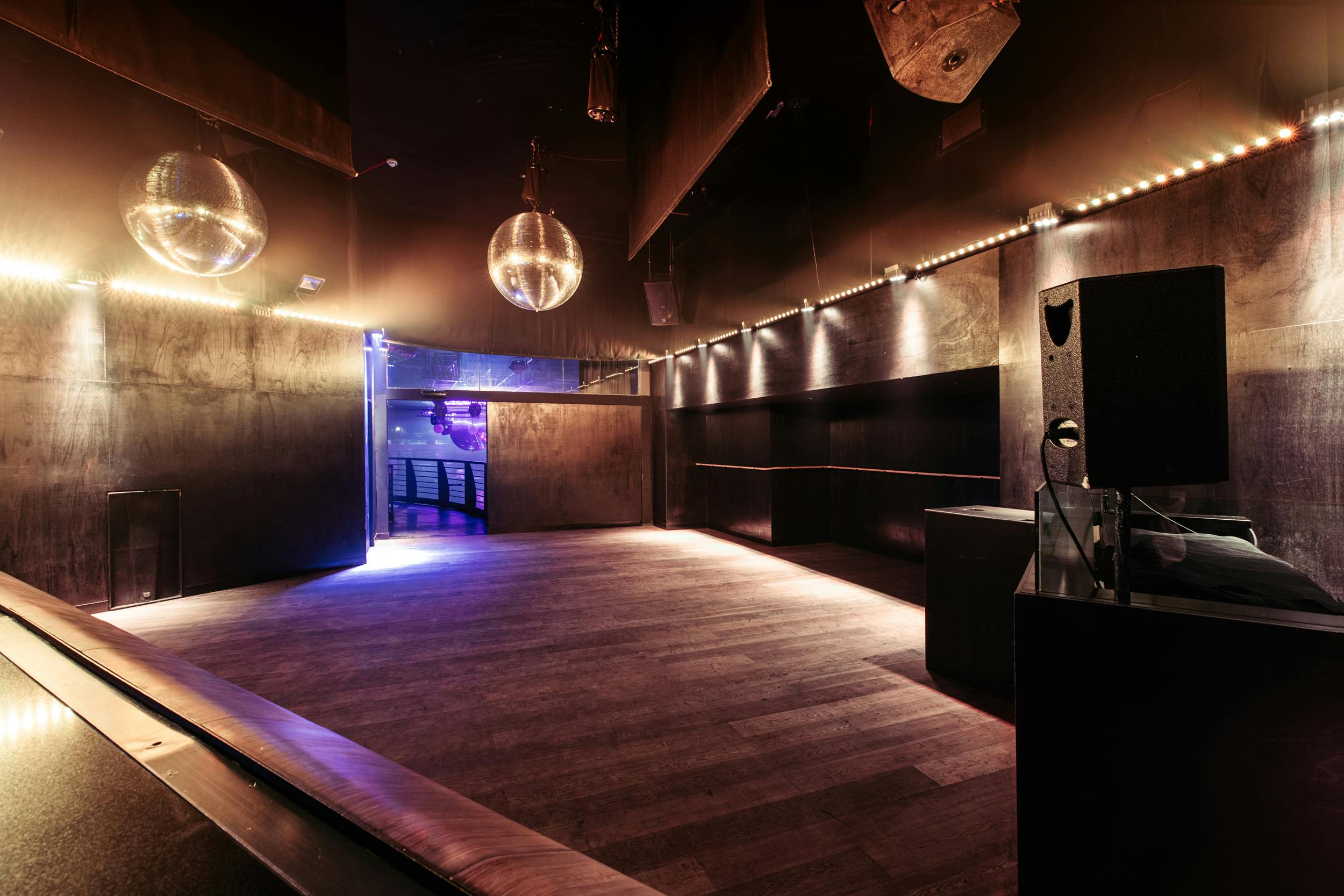 Sleek event space with dark walls, ideal for nightlife and private parties at Ministry of Sound.