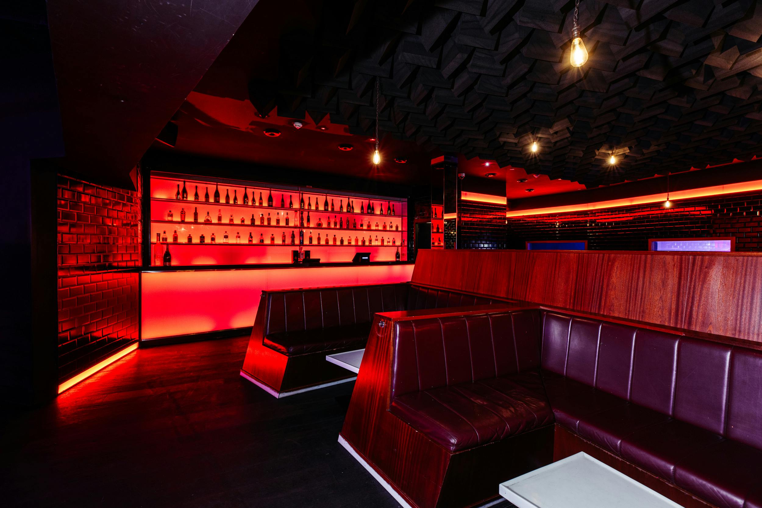 Modern lounge with ambient lighting, ideal for cocktail receptions and networking events.