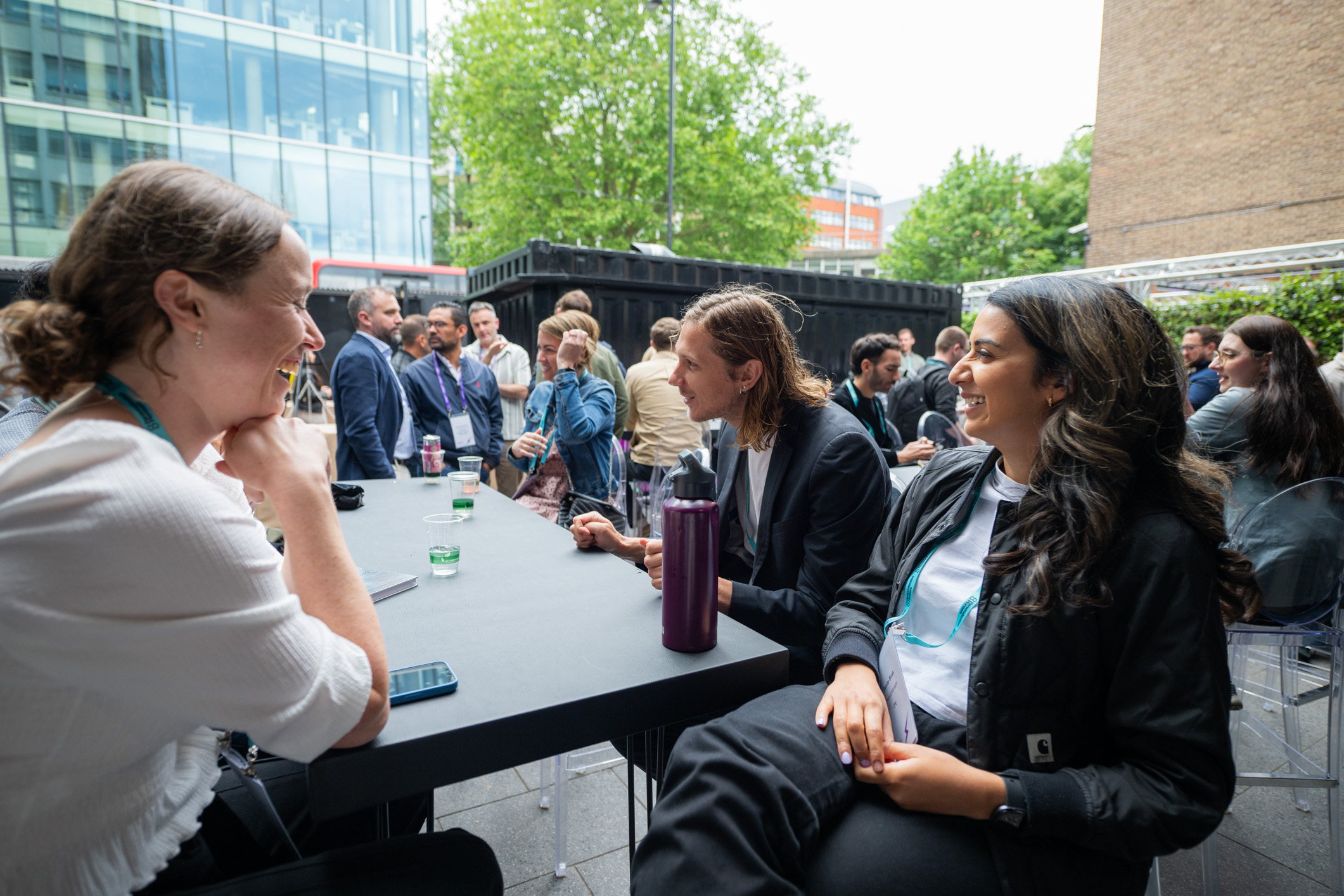 Vibrant networking event in The Courtyard, Ministry of Sound with greenery and modern architecture. - Banner