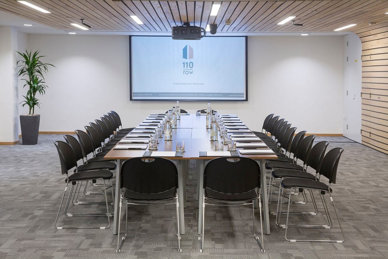 Seacole Room meeting space with long table, ideal for corporate events and workshops.