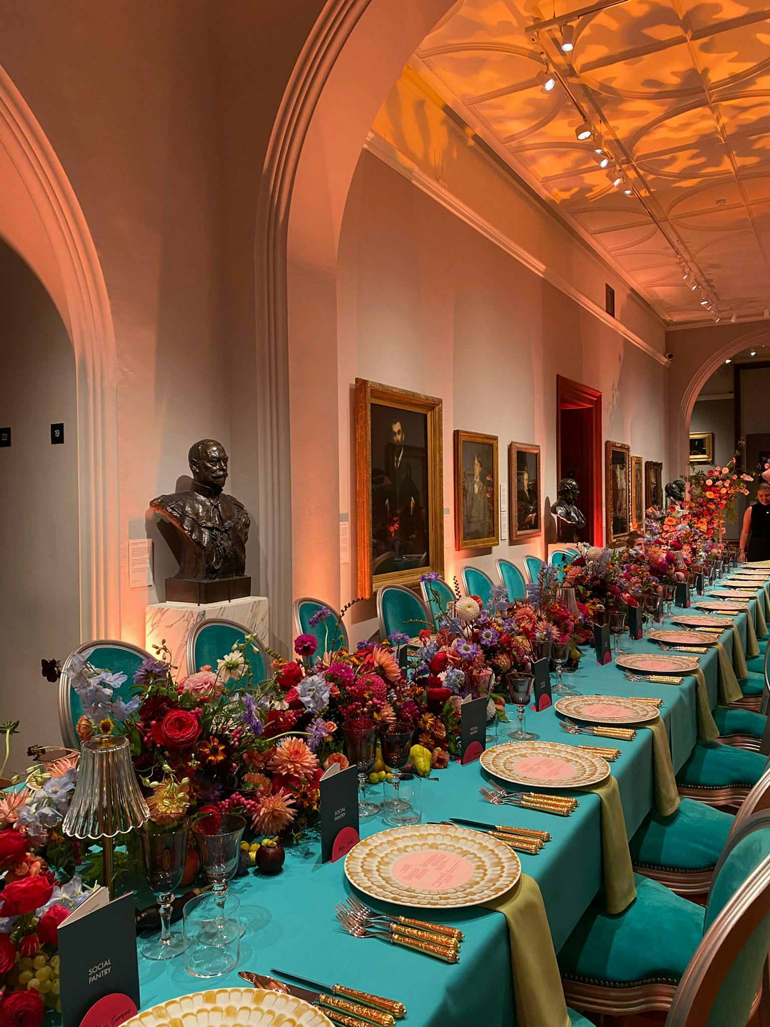 Elegant banquet table with floral centerpieces in Victorian Galleries, perfect for gala events.