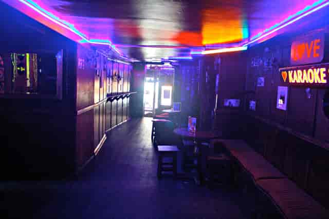 Neon-lit Hackney Social pub venue for corporate team-building mixers and happy hours.