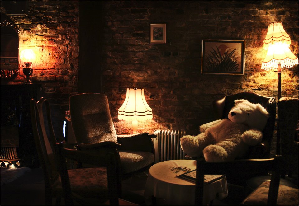 Little Nan's Bar VIP breakout space with brick walls for intimate event and corporate meeting venue.