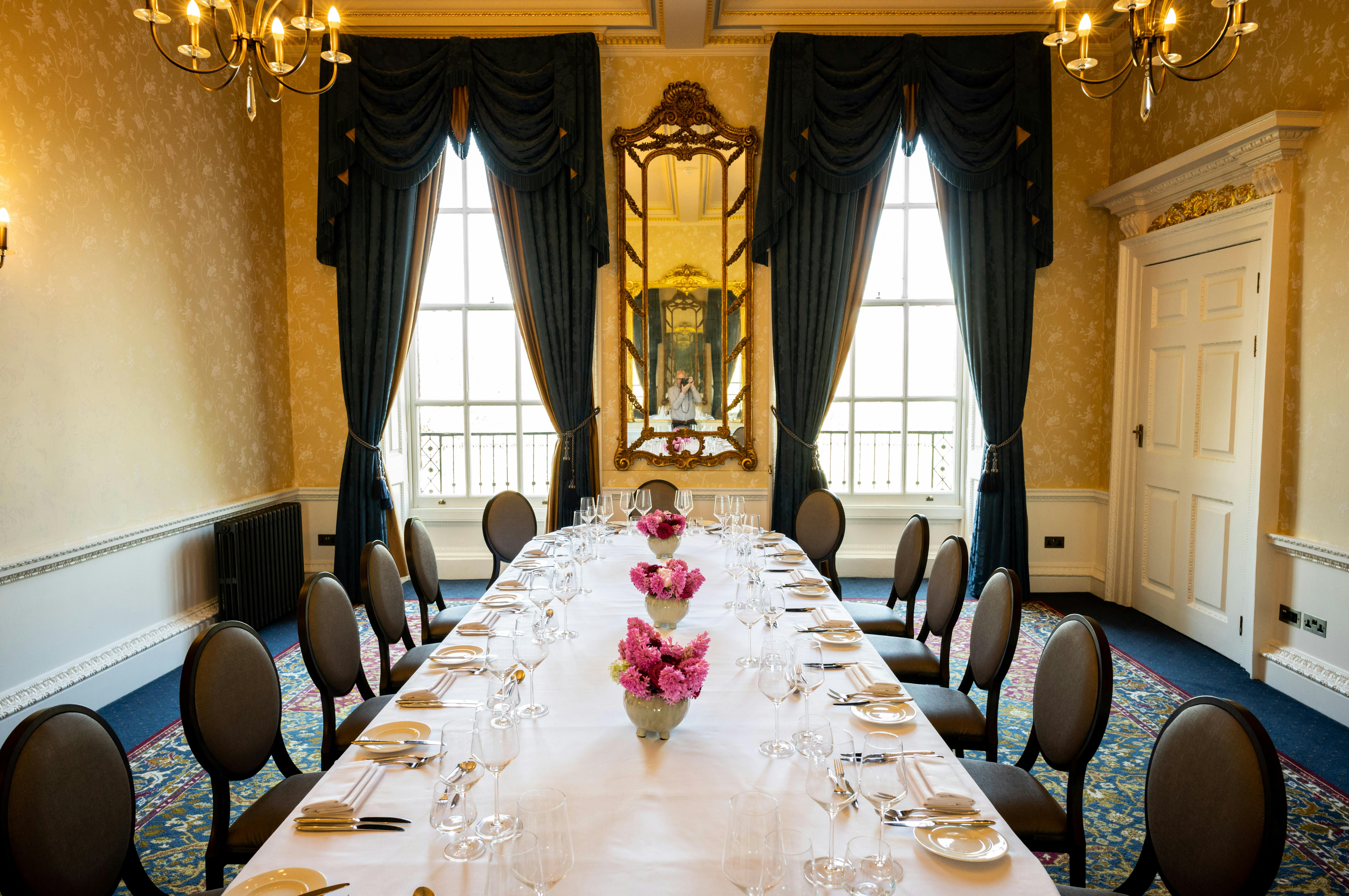 Elegant Rutland Room at Six Park Place, ideal for executive meetings with floral decor.