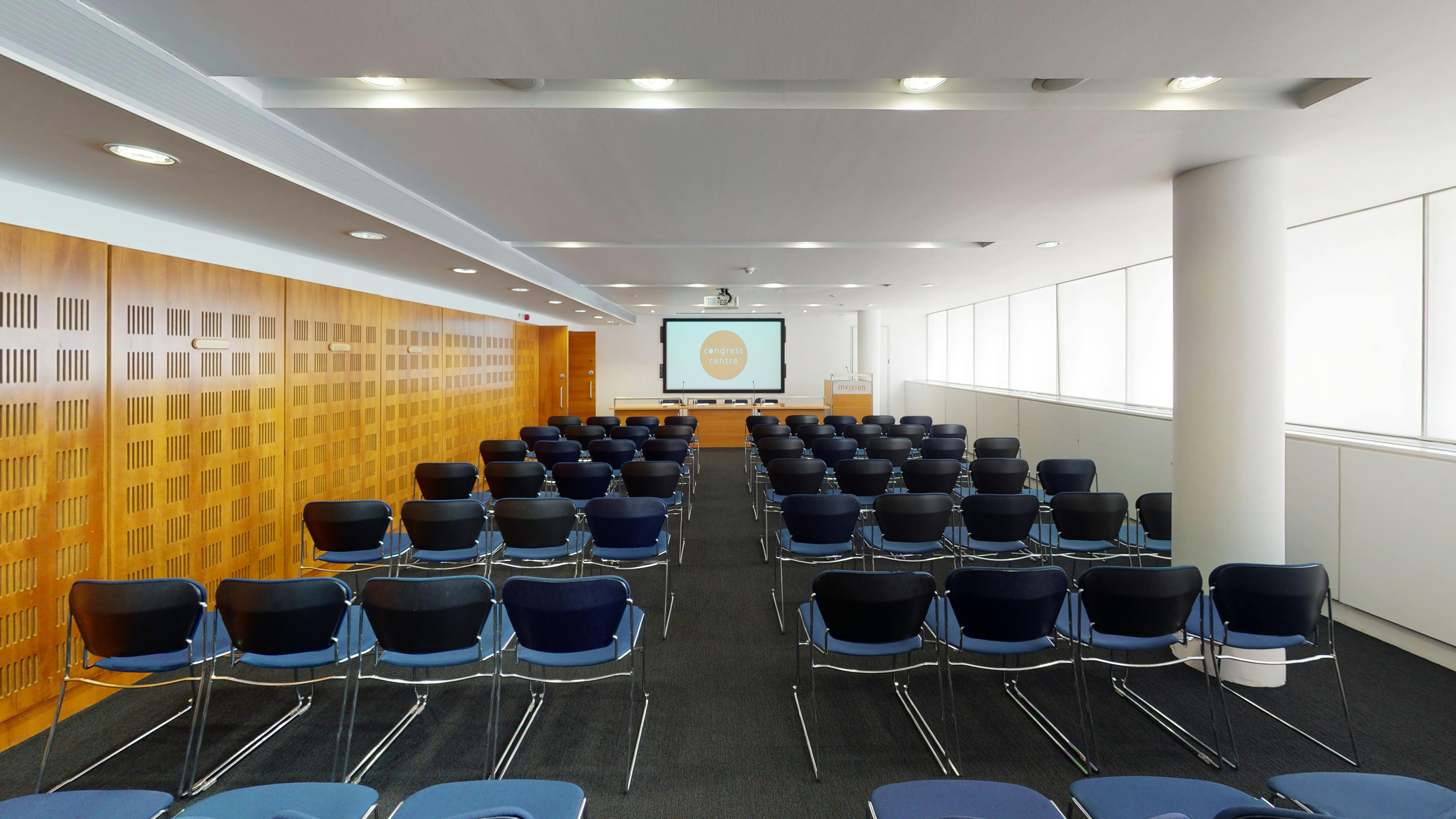 Invision Suite 1 & 2 meeting space with rows of chairs for conferences and workshops.