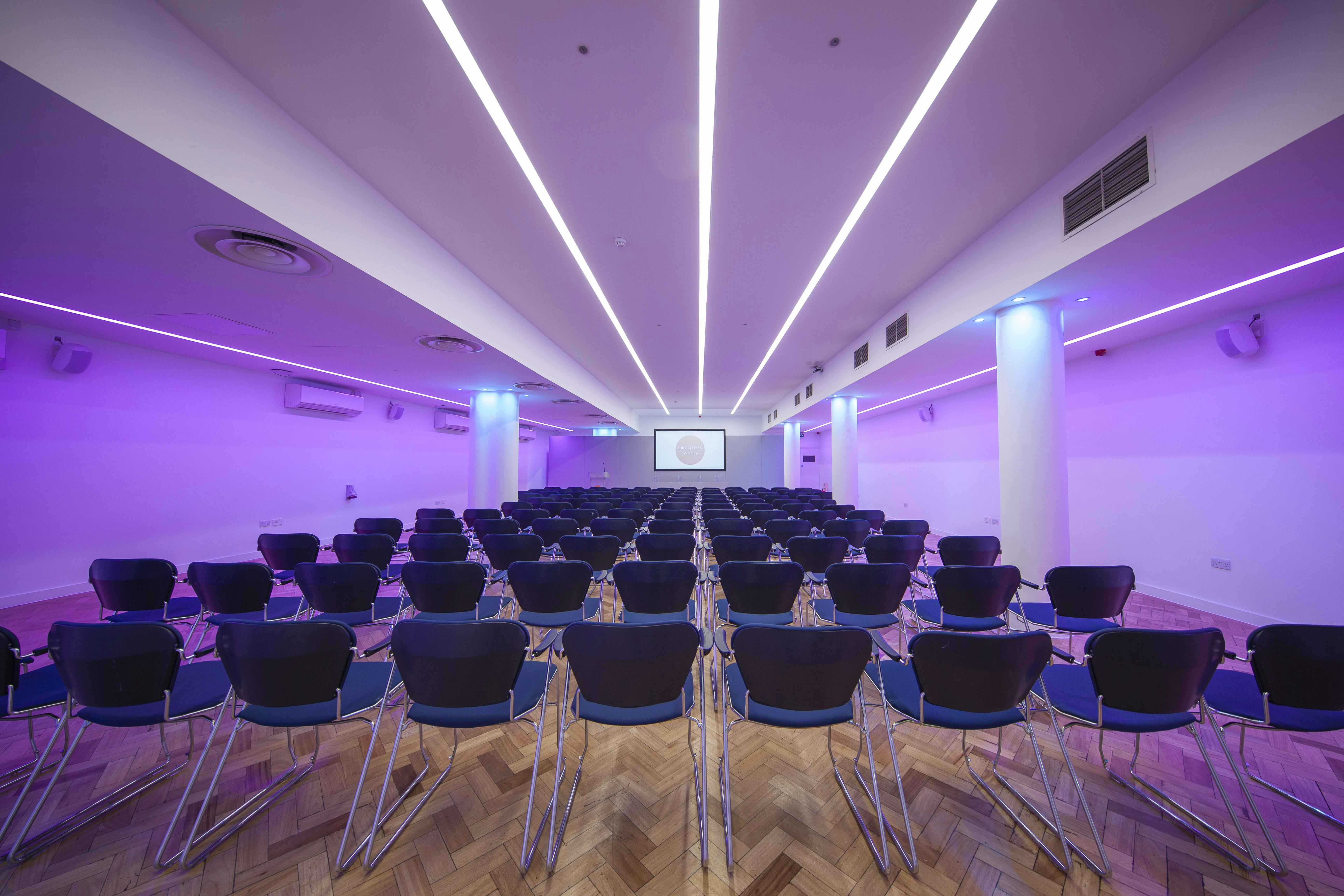Modern Congress Suite with sleek chairs, ideal for conferences and presentations.