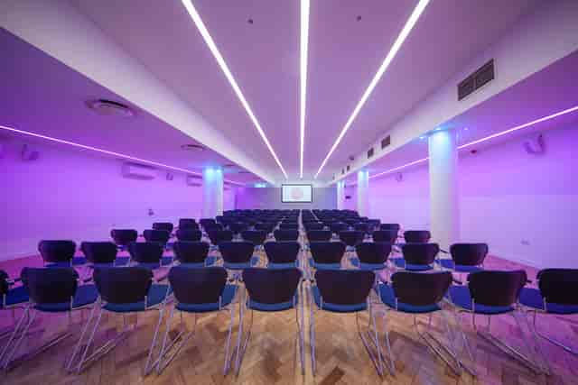 Modern Congress Suite with sleek chairs, ideal for conferences and presentations.