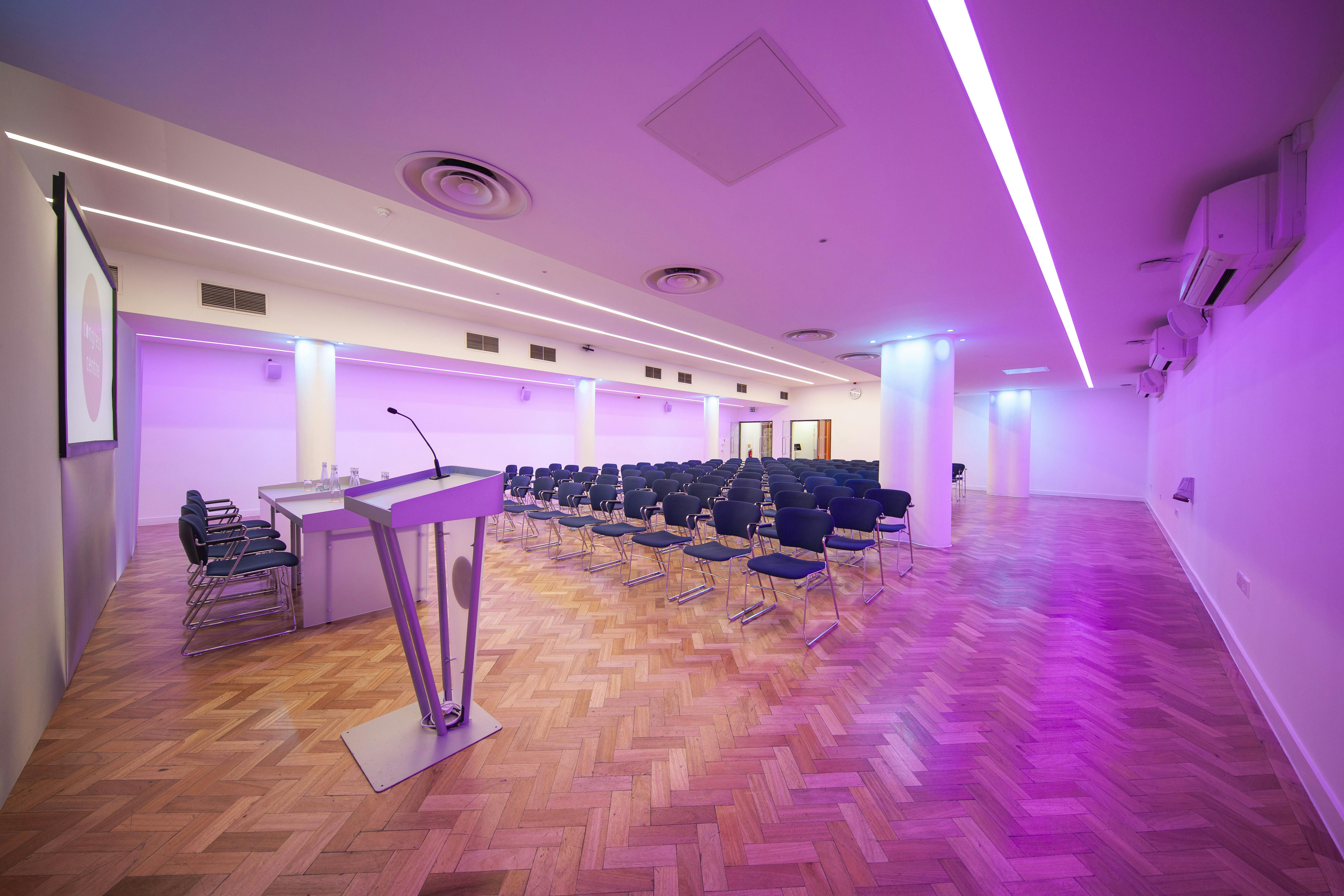 Modern Congress Suite with sleek podium, ideal for conferences and corporate events.