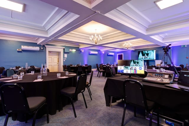 Donald English in Central Hall Westminster, modern meeting room for presentations and workshops.