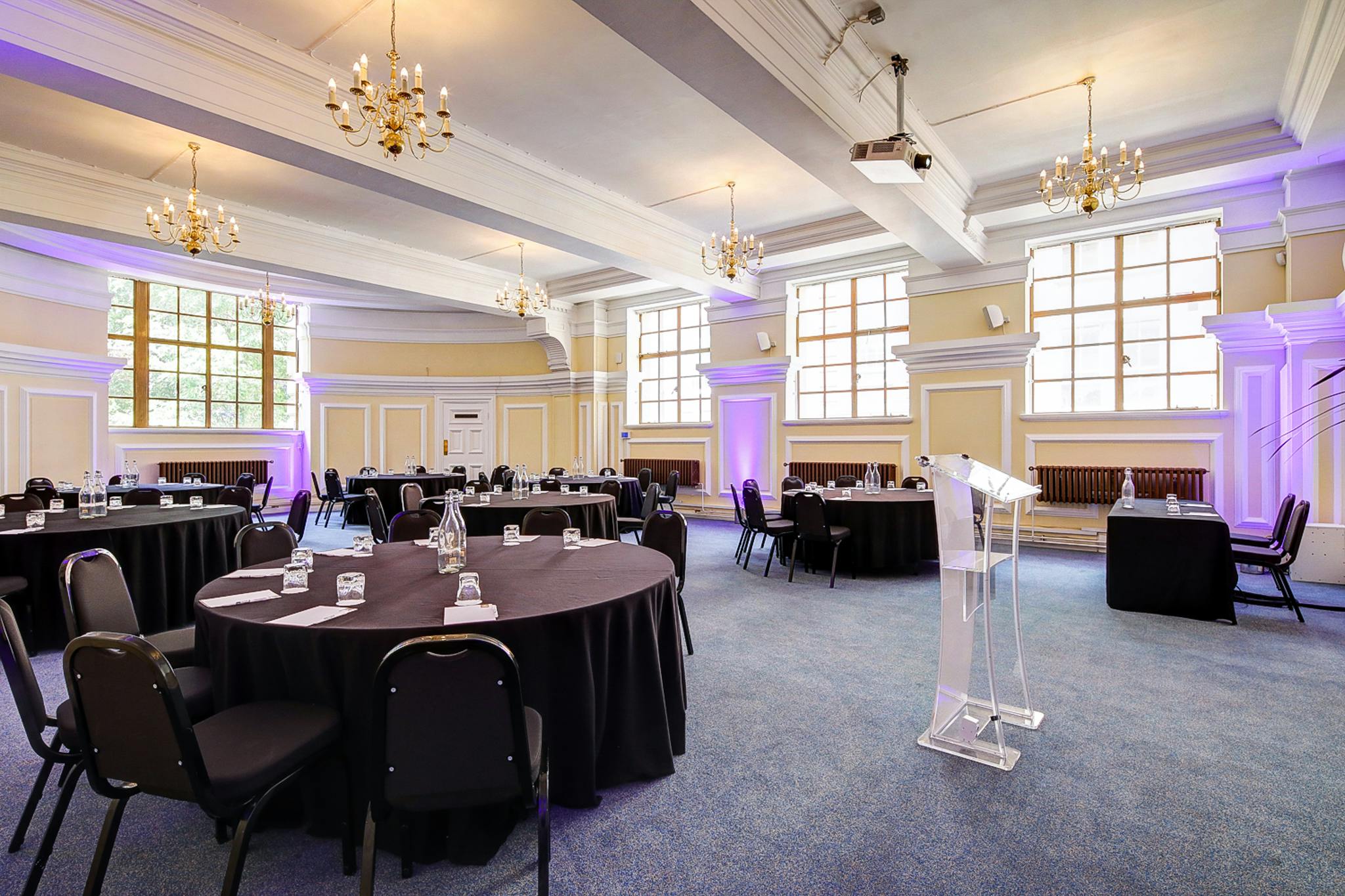 George Thomas at Central Hall Westminster, elegant conference setup with round tables.