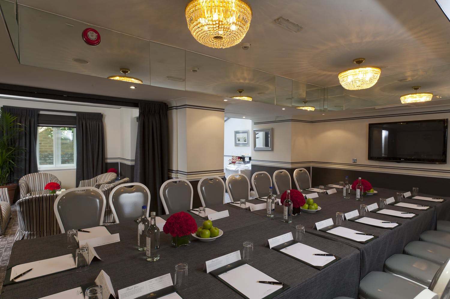 Woburn Suite meeting room with elegant decor, perfect for corporate events and presentations.