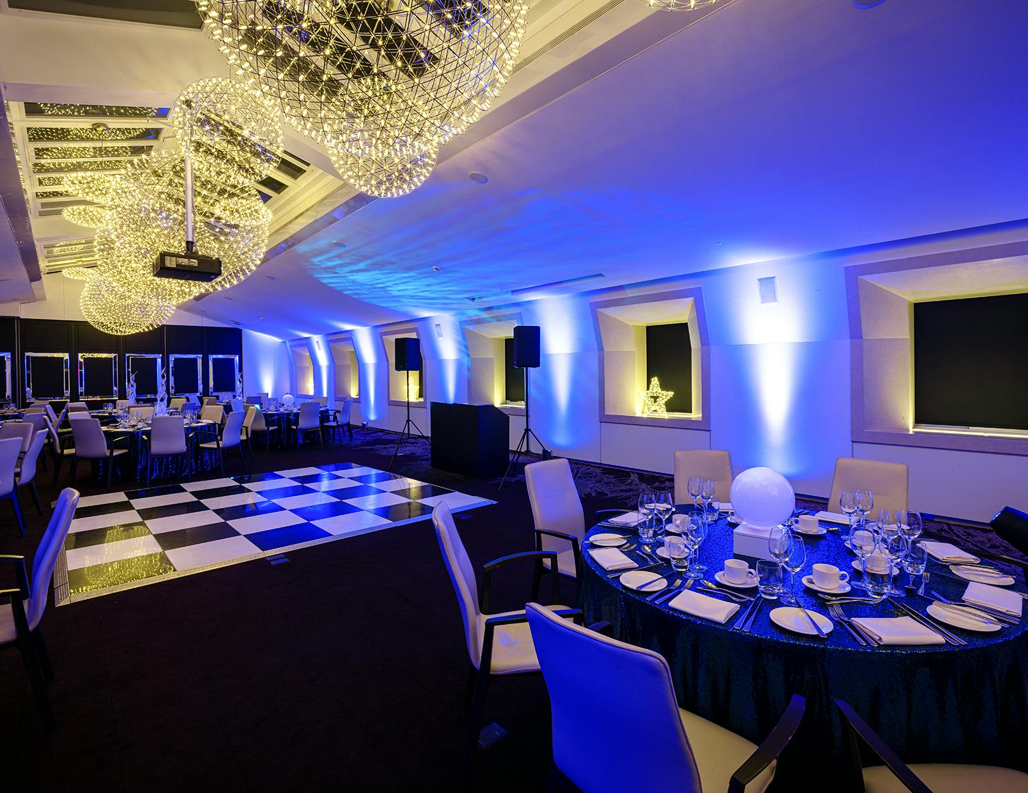 Elegant event space with chandeliers at 30 Euston Square for corporate events and celebrations.