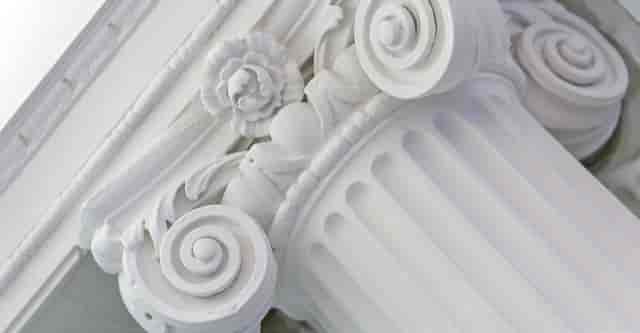 Elegant white column at The Ruby Salon, perfect for sophisticated events and gatherings.