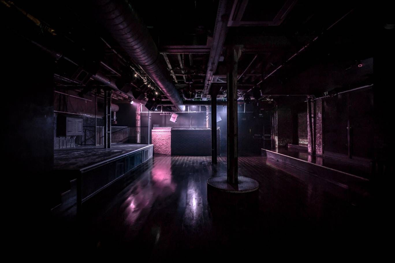 Versatile XOYO venue with industrial vibe, perfect for corporate events and celebrations.