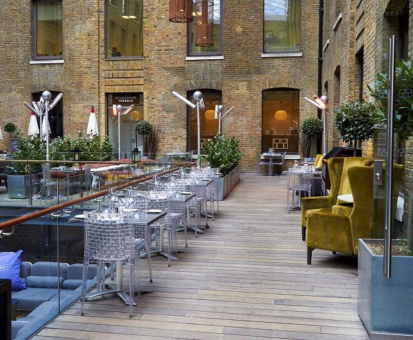 Stylish outdoor venue with modern furniture for events in Devonshire Terrace.