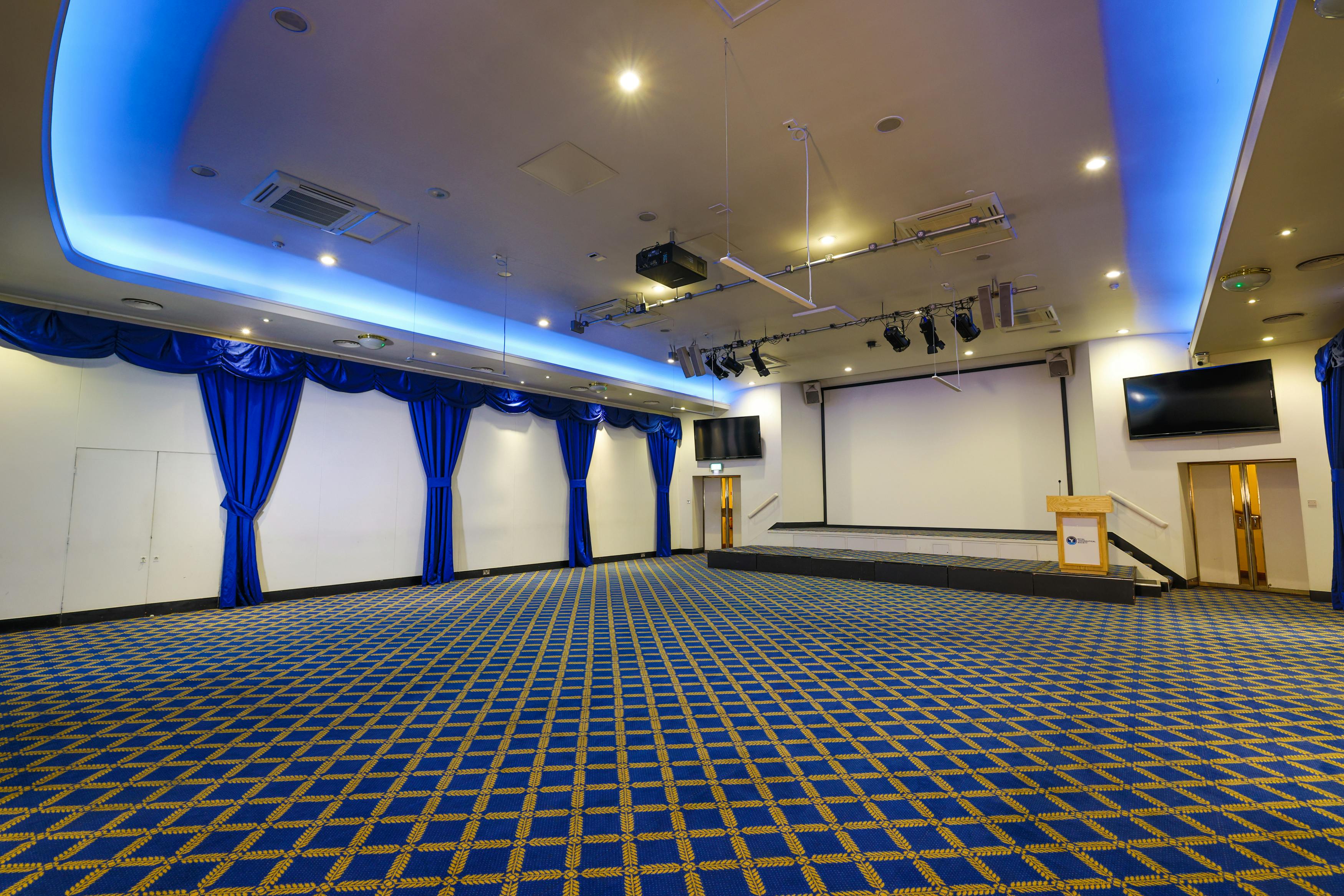 Bill Boeing Room event venue with blue lighting, ideal for conferences and workshops.