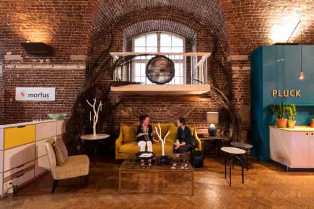 Stylish meeting space with natural elements for networking and collaboration events.