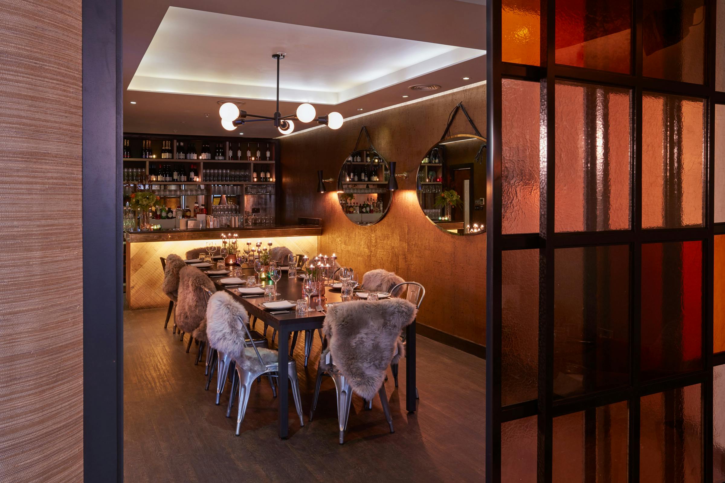 Intimate dining space at The Happenstance, perfect for private events and networking dinners.