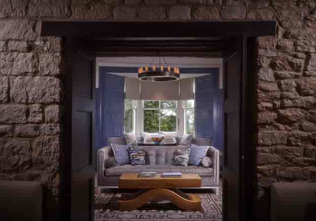 Cozy lounge at Dormy House Hotel, ideal for networking and informal meetings.