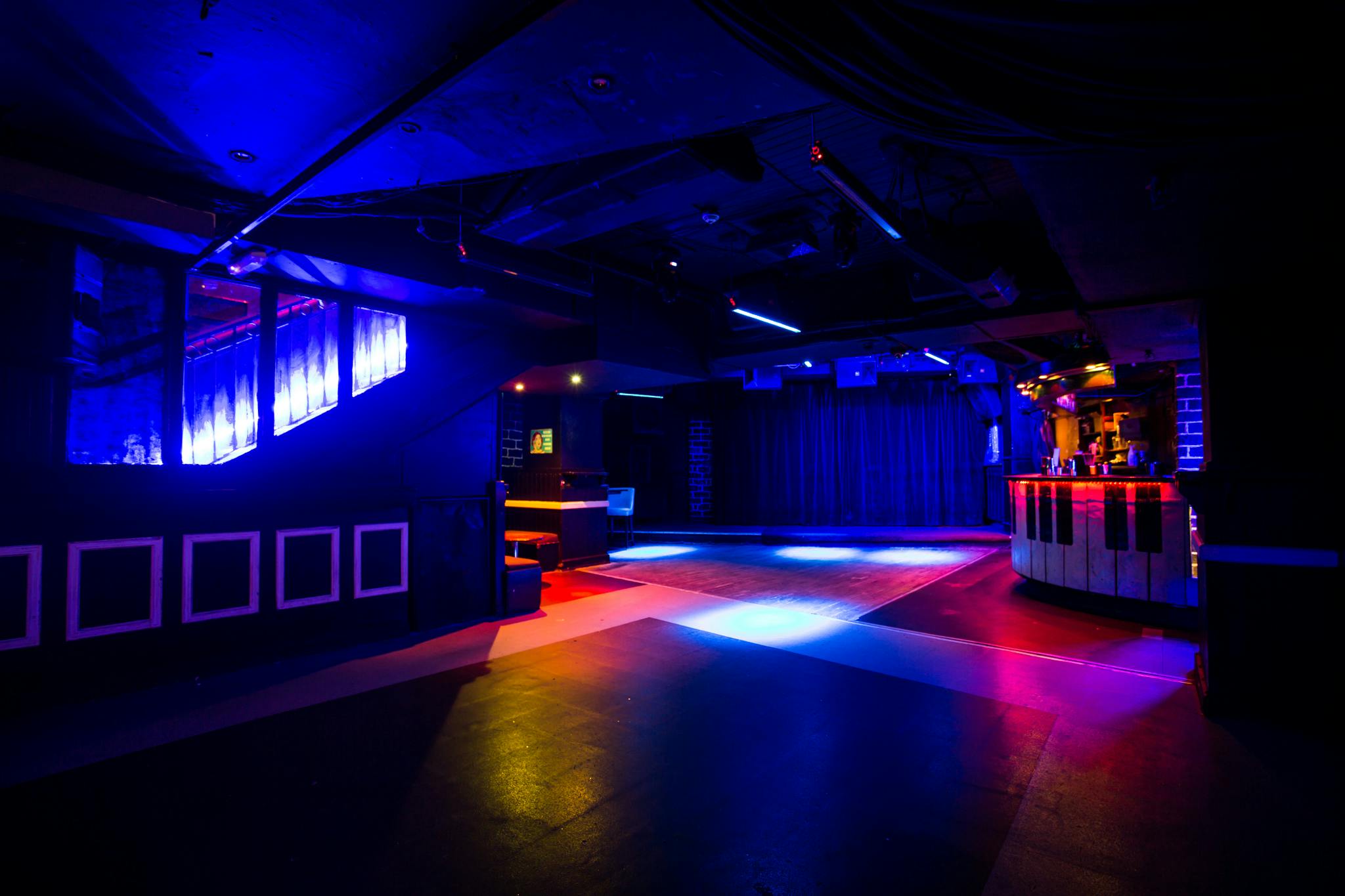 Versatile event space at Bar Rumba with dynamic lighting for corporate and social events.