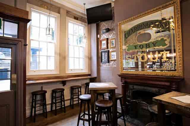 Cozy pub corner at The Harrow for casual networking and informal breakout events.